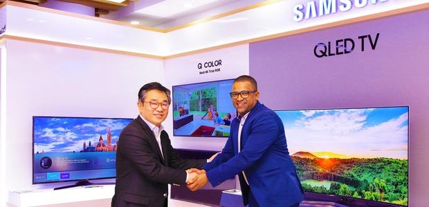 Managing Director, Samsung East Africa, John Park (left) shaking hands