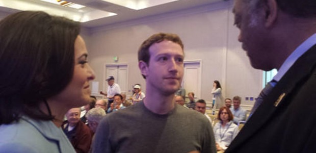 Jesse Jackson, Mark Zuckerberg, Sheryl Sandberg at shareholder meeting.