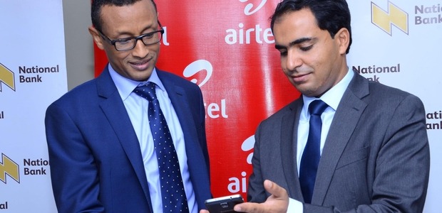 Airtel Kenya CEO Adil El Youssefi shows the National Bank