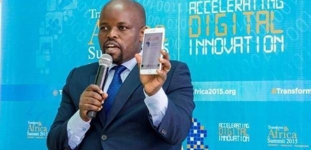 Rwanda's Youth and ICT minister Jean Philbert Nsengimana shows the