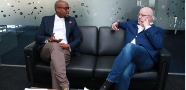 Interswitch East Africa CEO Paul Ndichu confers with Fintech speaker