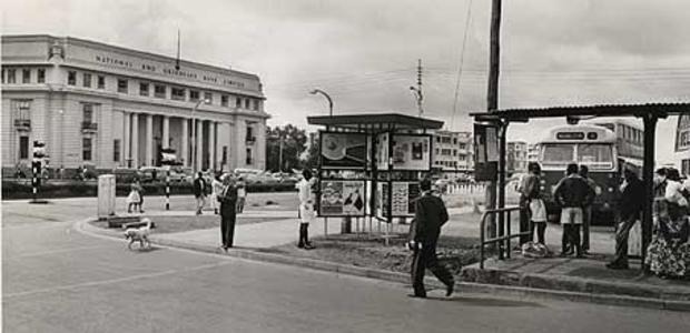 A scene of National and Grindlays Bank opposite the Bus