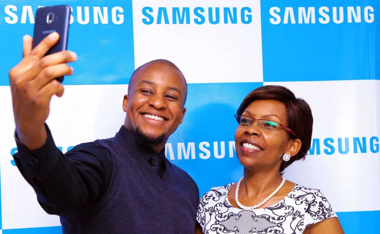 Samsung Product Manager Mobile Division Ryan Mule takes a selfie with their Head of Marketing Citizenship and PR at Samsung East Africa Patricia King'ori at the launch of the Samsung Grand Prime Pro (2018)