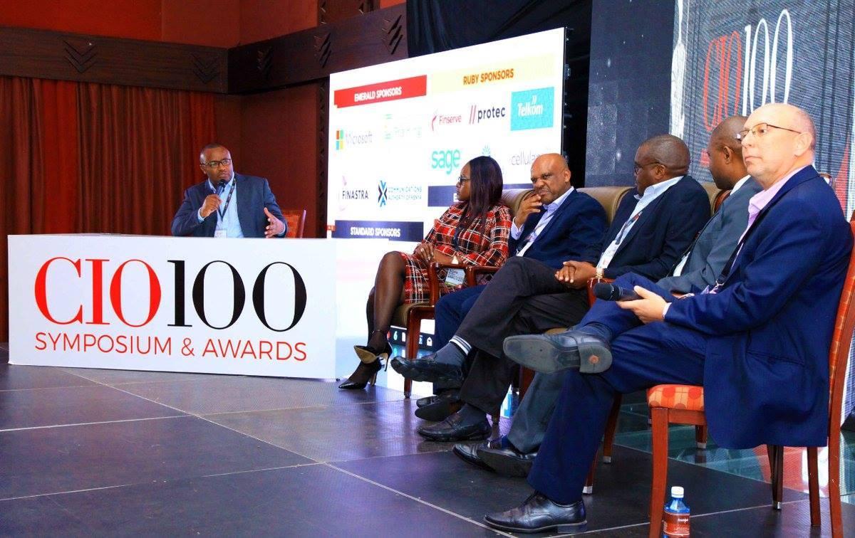 CIO Multichoice, Francis Kamuyu moderates a panel discussion during the