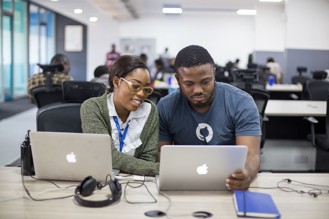 Two of the 1000 Andela developers working out of their