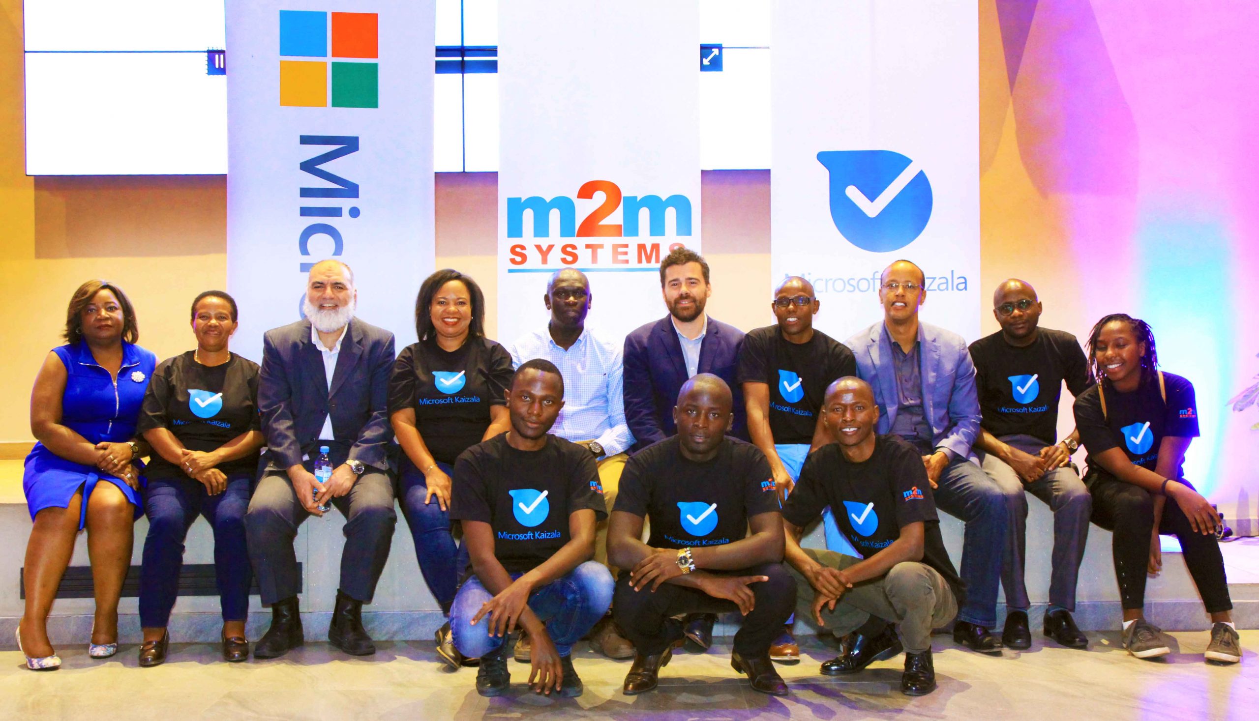 Teams from M2M Systems and Microsoft take a group photo