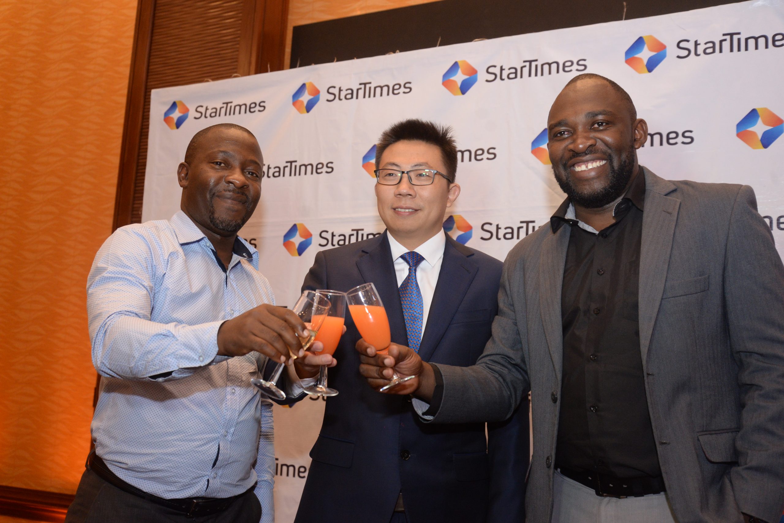 Mr. Aldrine Nsubuga (left) new StarTimes Regional Marketing Director, Mr.
