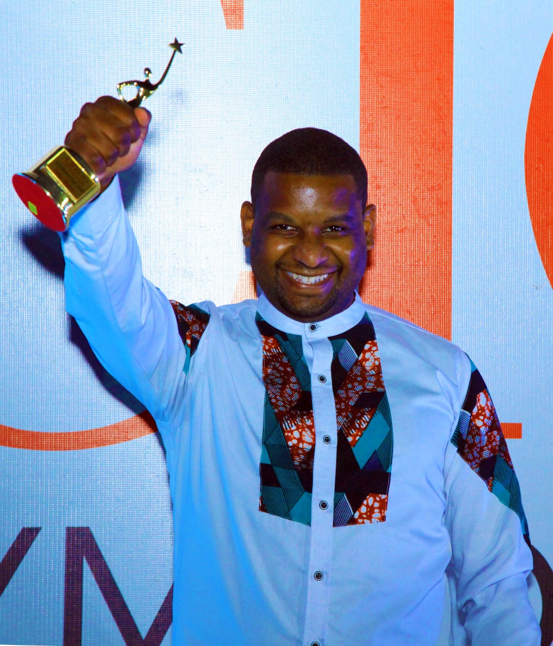 George Njuguna lifts his award after he was pronounced CIO