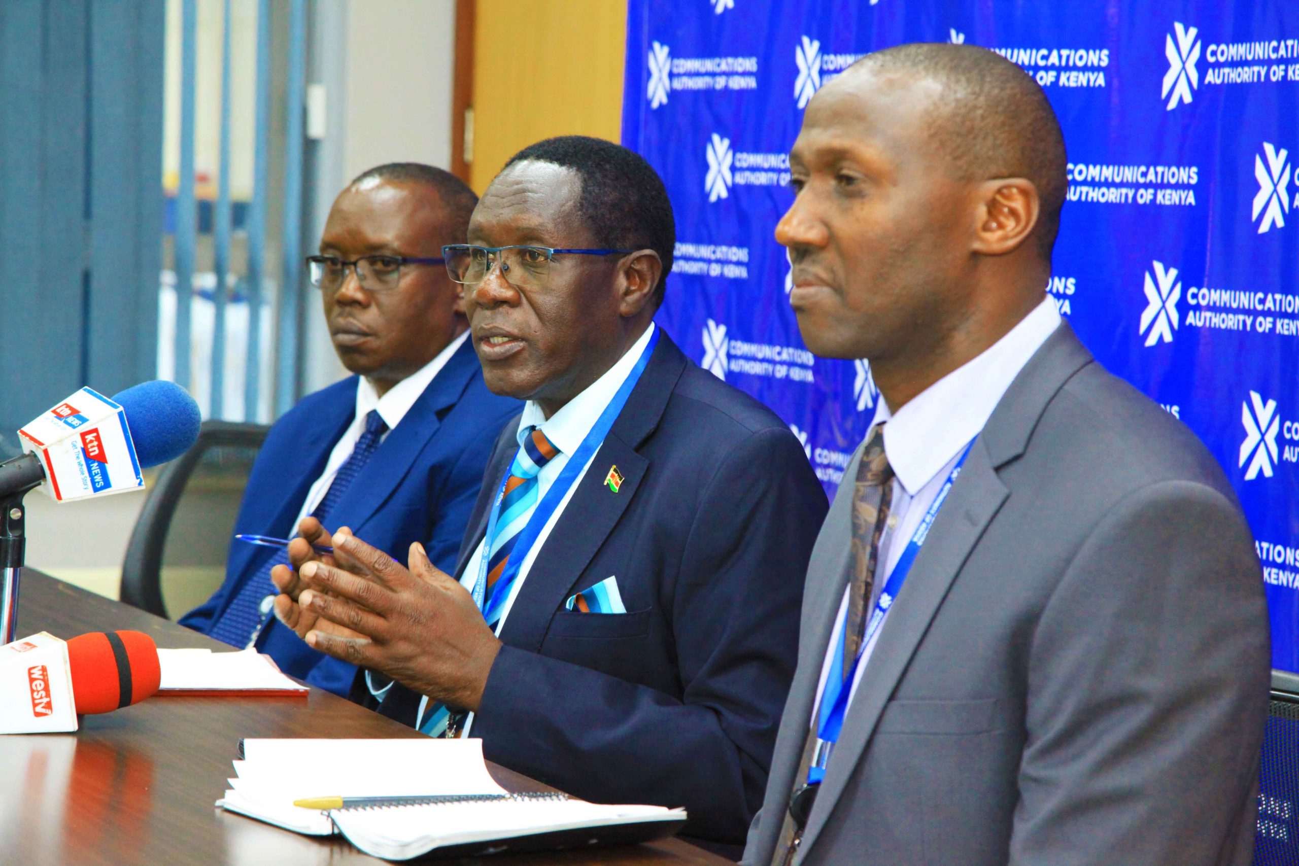 Engineer Francis Wangusi (centre), addresses the press during the launch