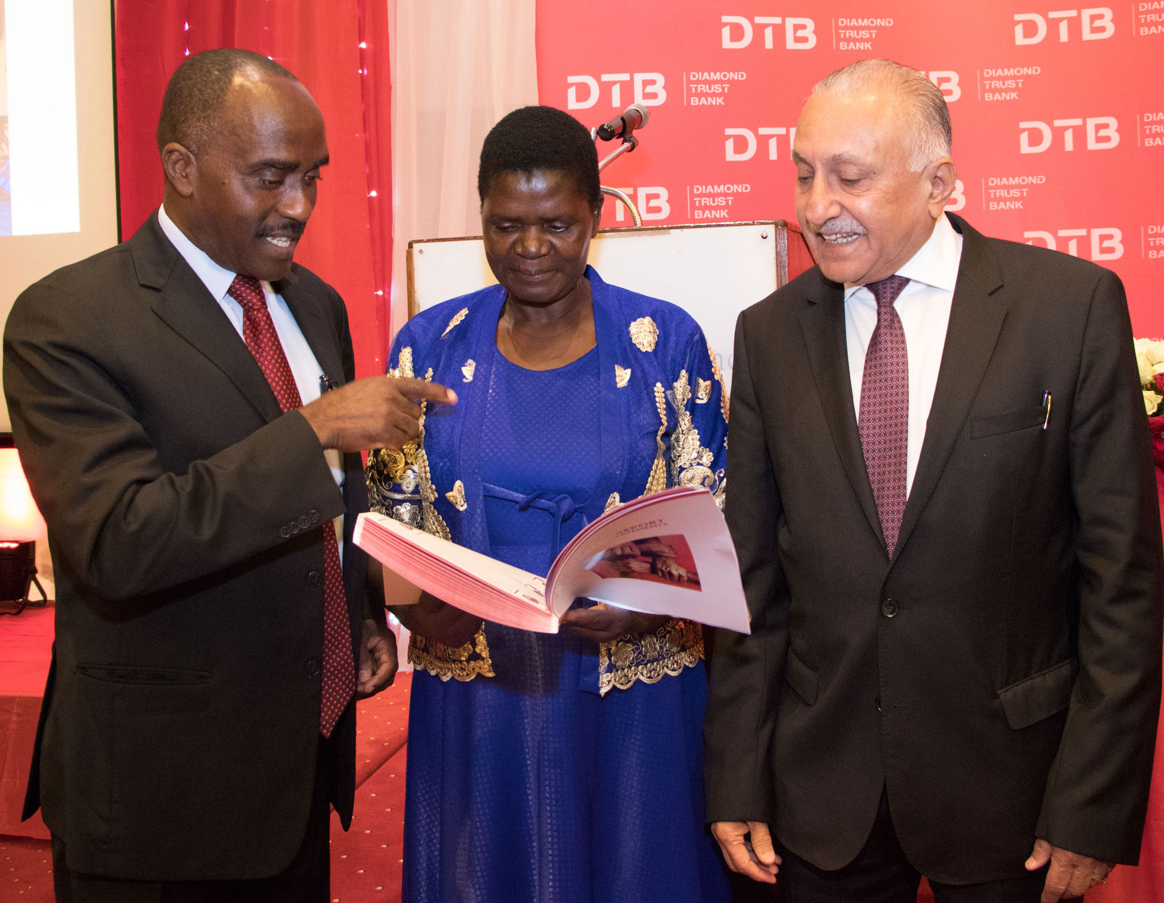 (L-R) DTB Chairman, Linus Gitahi together with a shareholder and