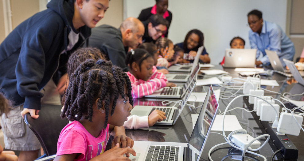 Students code at a past bootcamp in Australia