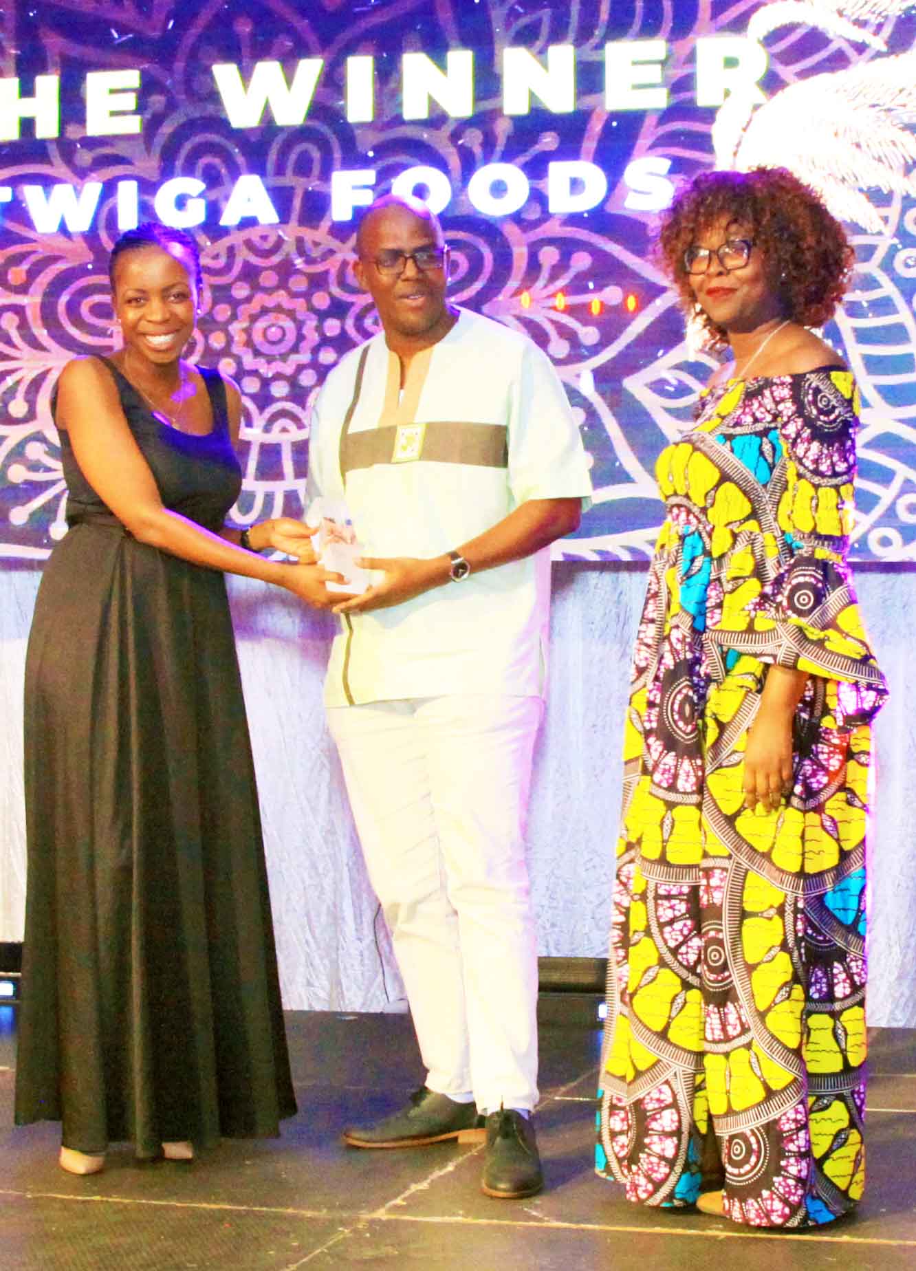 Caine Wanjau receives award at the CIO100 Symposium and Awards