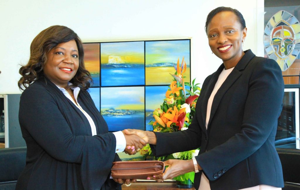 Laura Chite, CEO CIO EAst Africa (Left) exchanges a sponsorship