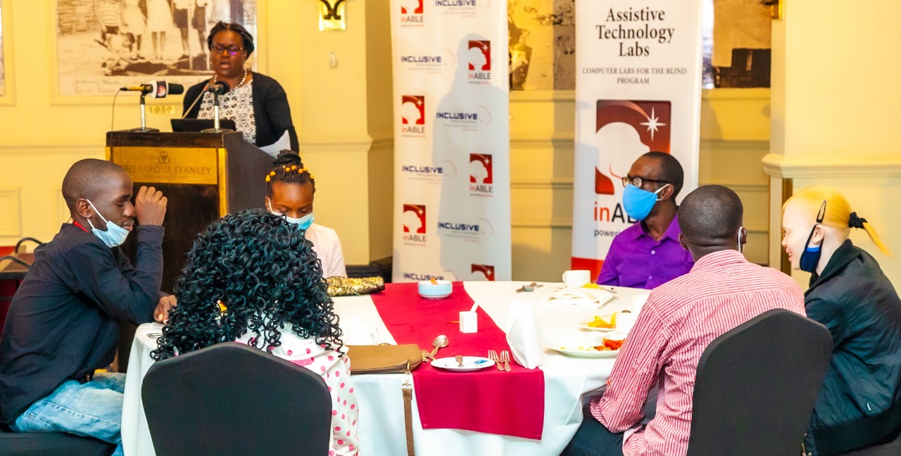 A group of visually impaired students attending the inABLE event