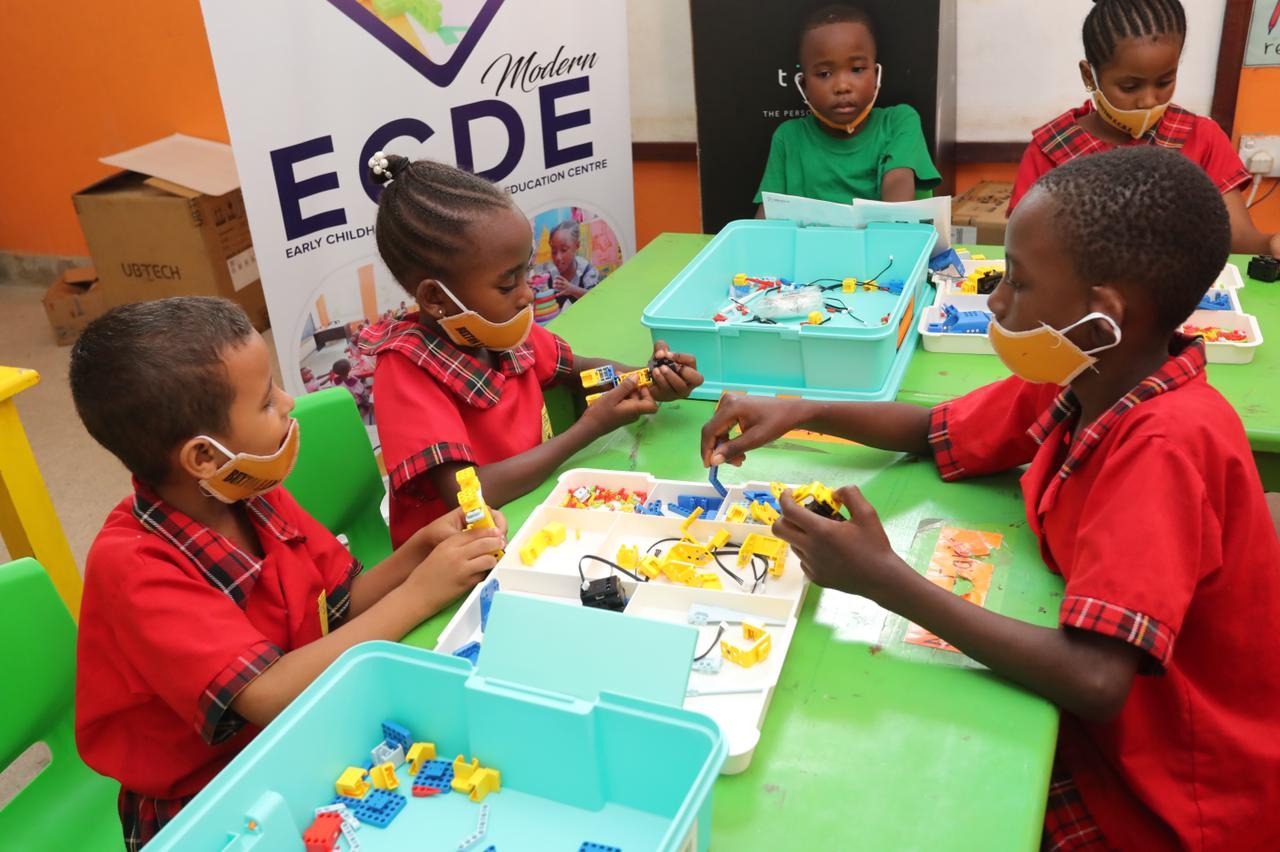 Young learners get a hand in the robotics kits during