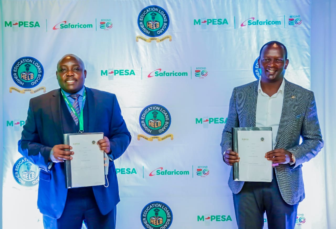 HELB Chief Executive Officer, Charles Ringera (left) and Safaricom Chief