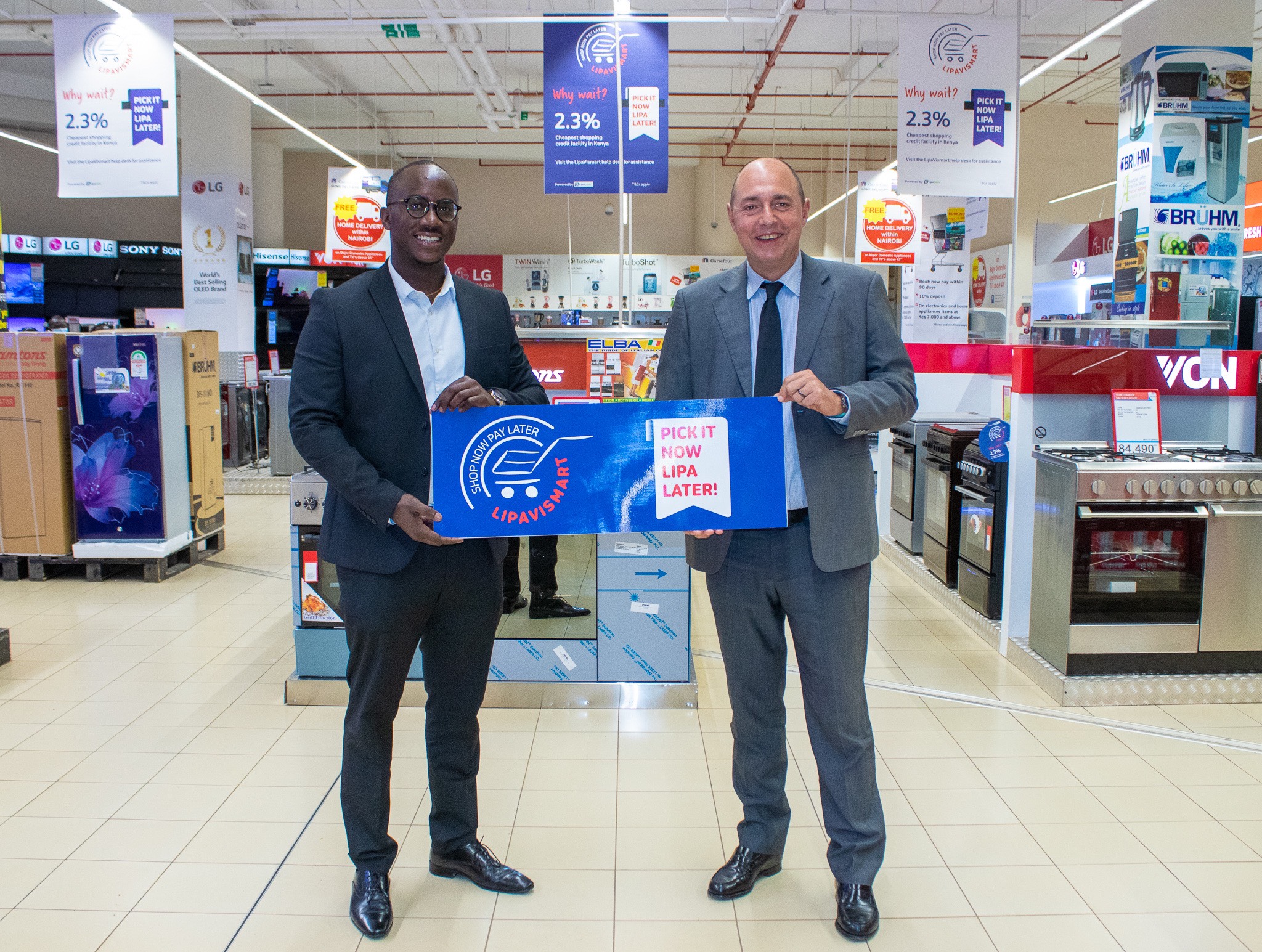 (Right to Left) Franck Moreau Country Manager - Carrefour East Africa and Eric Muli CEO Lipa Later during the ceremony to mark the roll out of the LipaVismart product powered by Lipa Later for all Carrefour customers