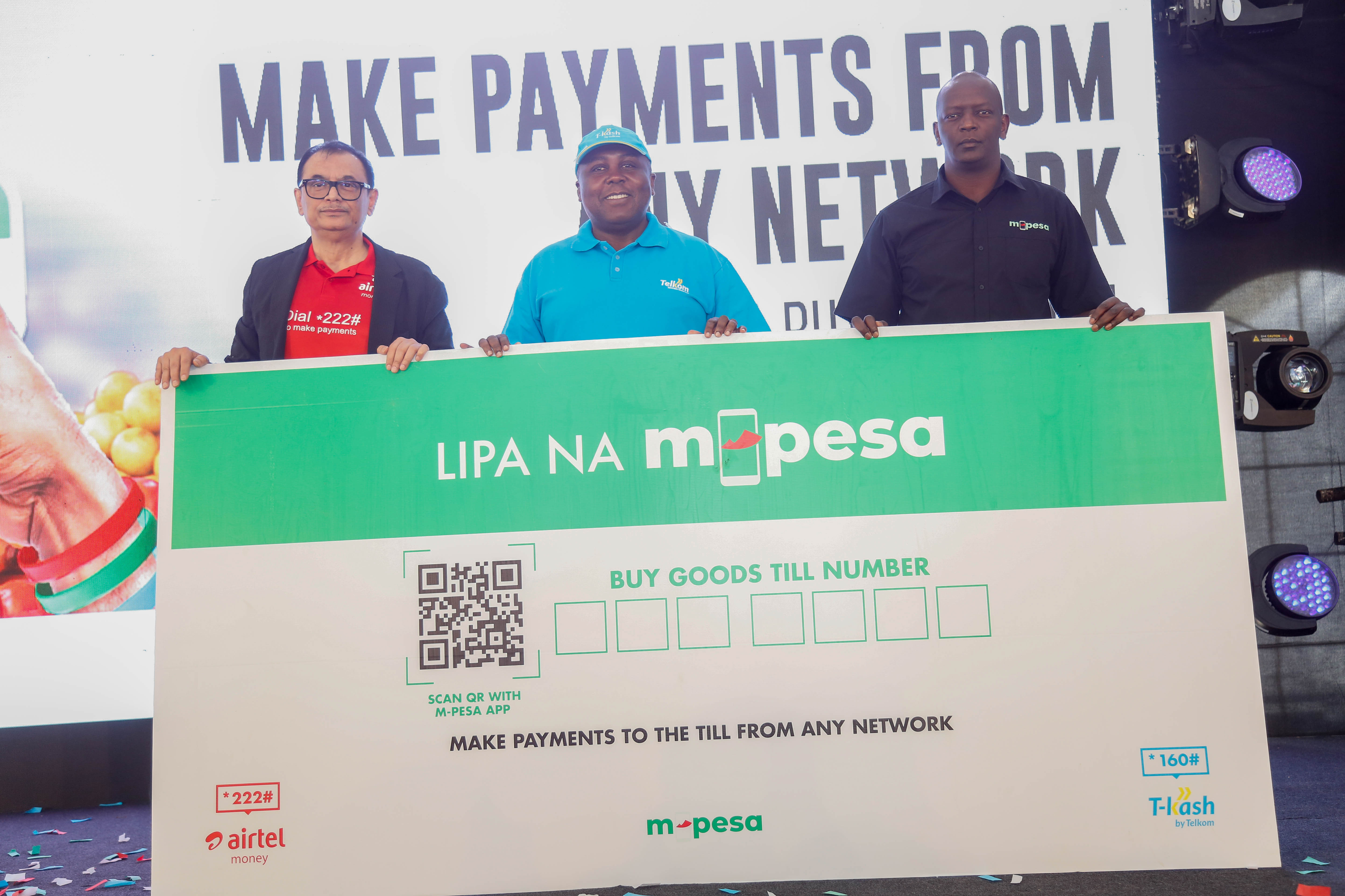 M-PESA Africa MD, Lopokoyit Sitoyo (right) Telkom Kenya CEO, Mugo