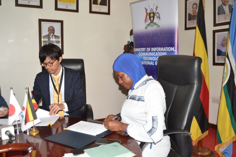 PS Amina Zawedde is flanked by JICA Representative during the signing of the MoU on Friday