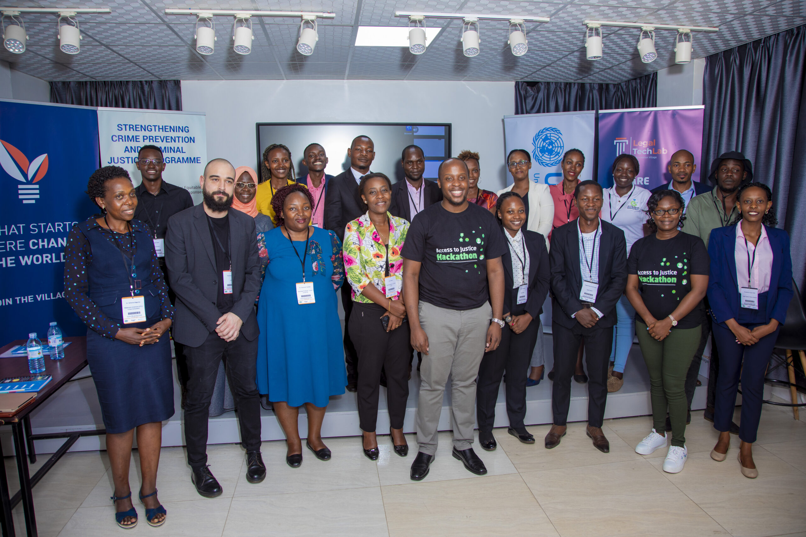 Winners of the Access to Justice hackathon that took place during the Future Lawyer Week pose for a picture with judges and partners.