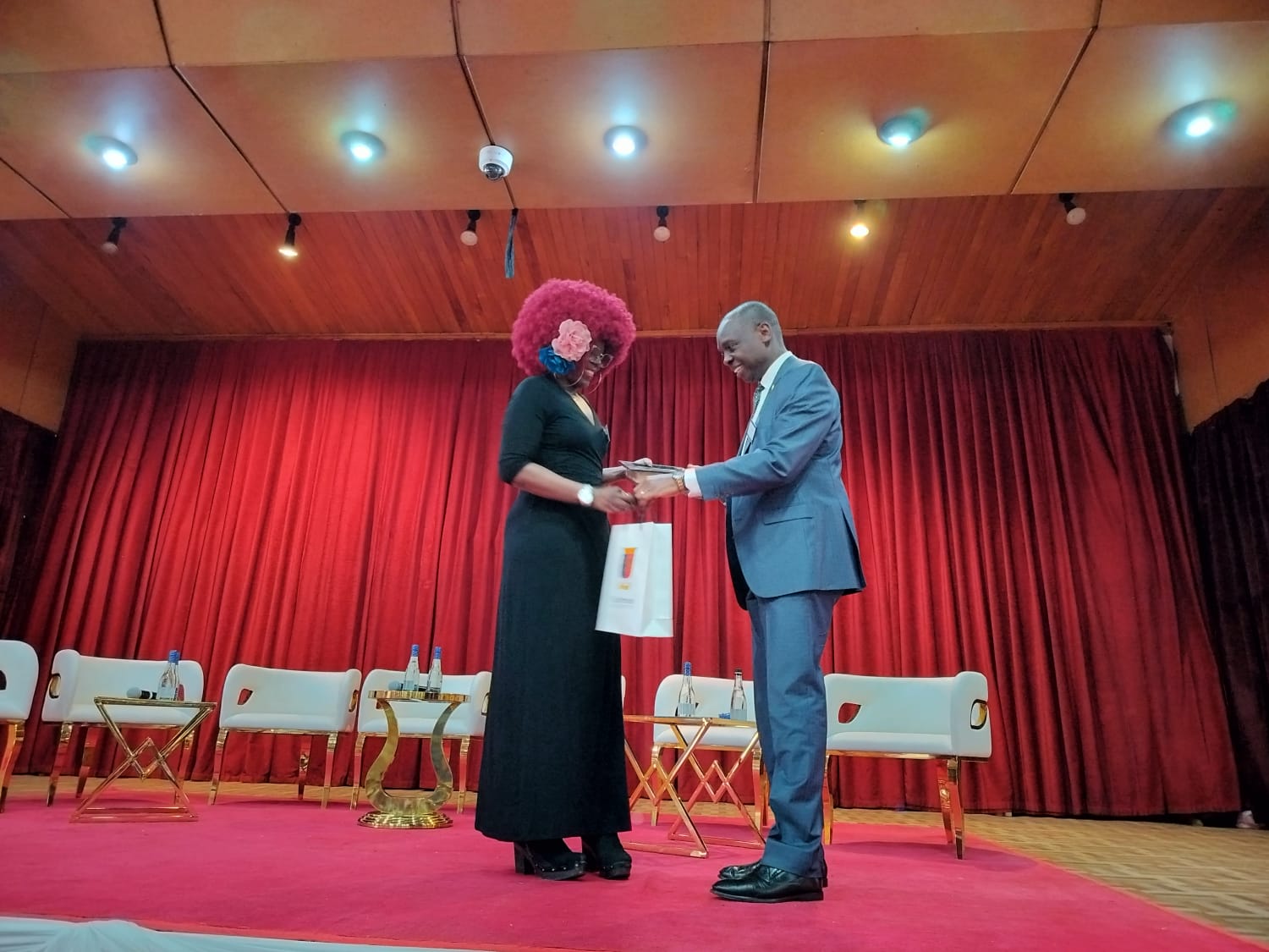 The Head of Content Africa, dx5ve, Carol Odero receiving an appreciation gift after addressing Strathmore alumnis at the event.