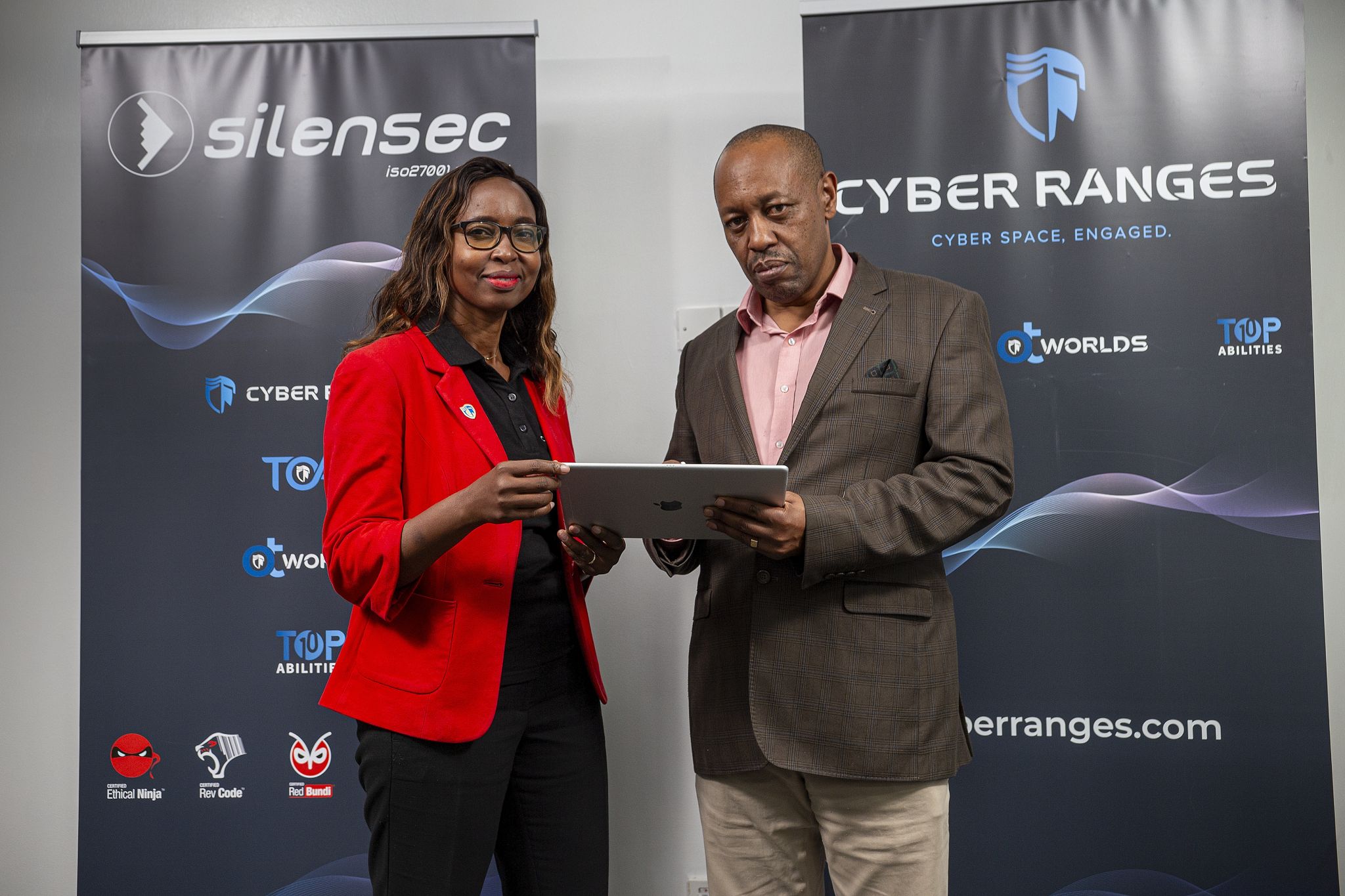 dx5ve Co-founder and Director, Andrew Karanja (right) with Pauline Omollo, the Head of Sales at CYBER RANGES. [Photo: Samuel Mwangi - CIO Africa]