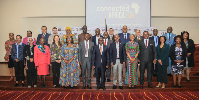Eng. John Tanui, Principal Secretary, State Department of ICT and Digital Economy in Kenya (with black suit centre in front), together with country representatives from African countries during a media briefing session about Connected Africa Summit 2024 in Nairobi in December 2023.