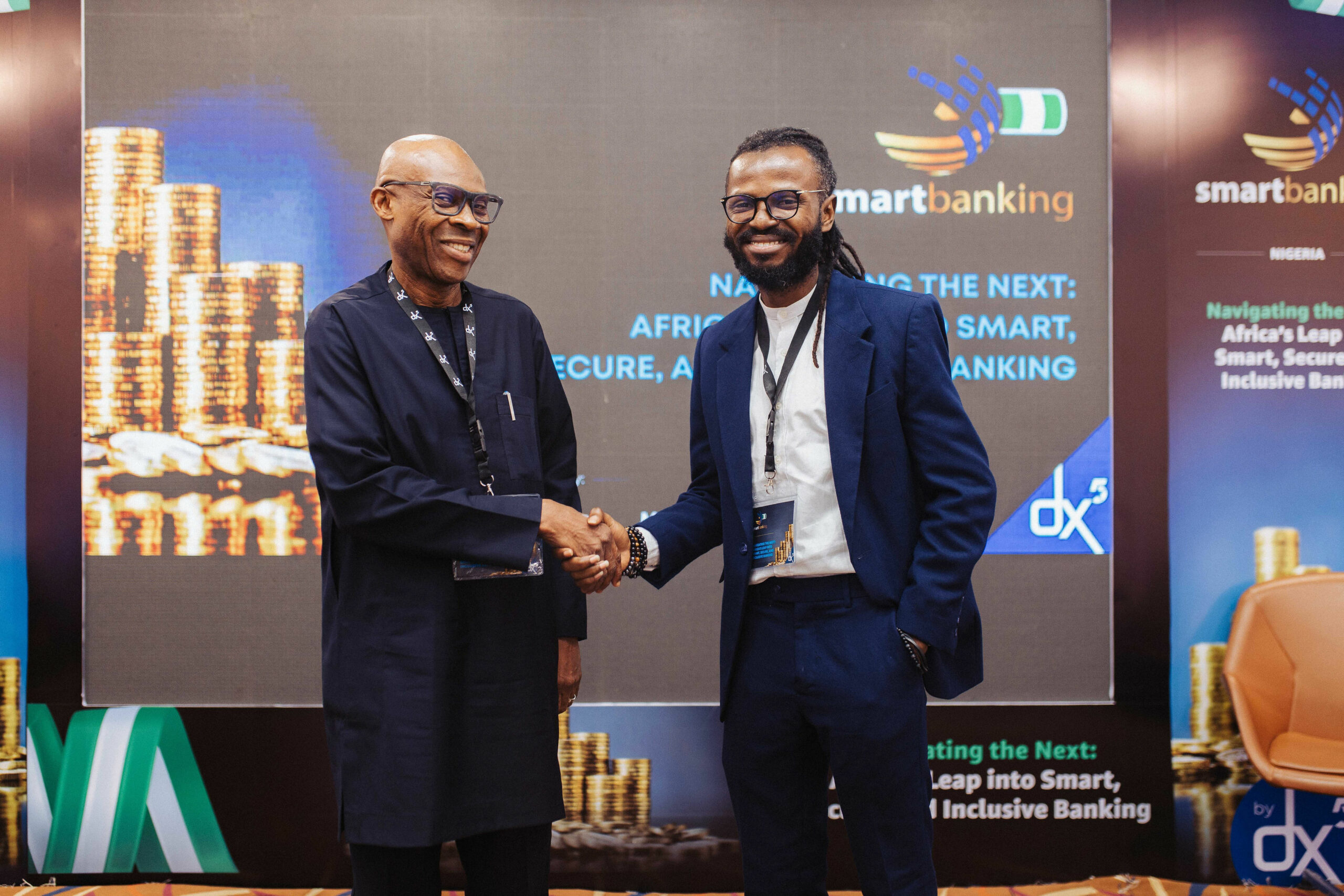 Dr. Obrimah Babatunde, COO, Nigerian Fintech Association, poses with Ayo Onasanya, the founder of Karla at the Smart Banking Summit in Nigeria.