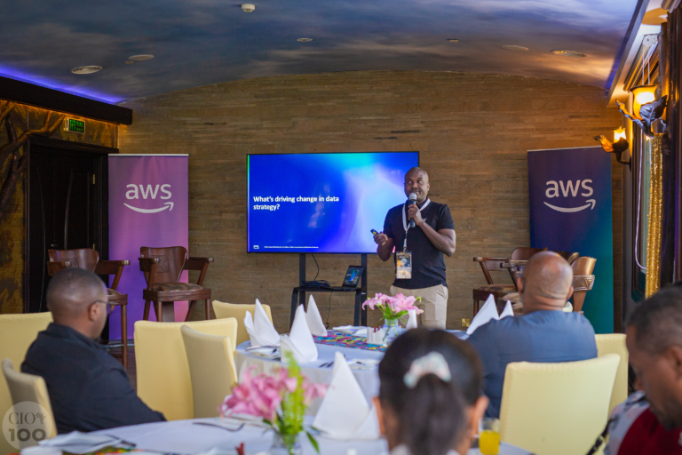 Edward Kiarie, Solutions Architect at AWS, giving his presentation at the AWS Breakfast during the CIO100 Symposium and Awards.