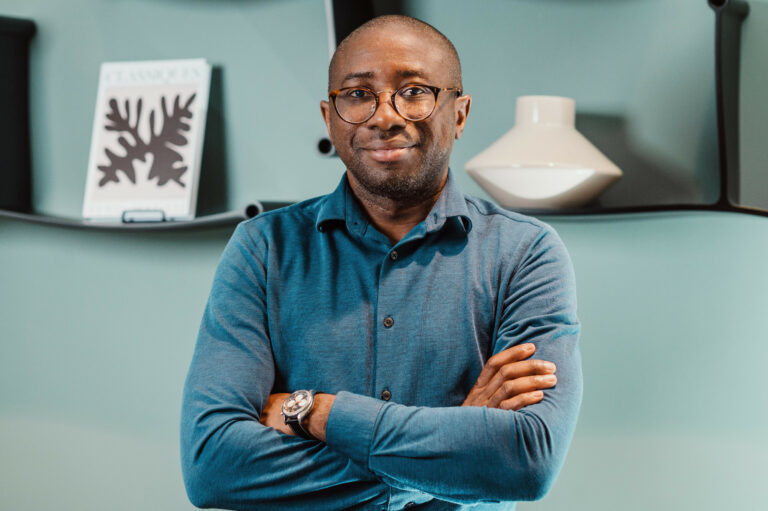 Ola Oyetayo, CEO and Co-Founder of Verto, isn't your typical finance professional